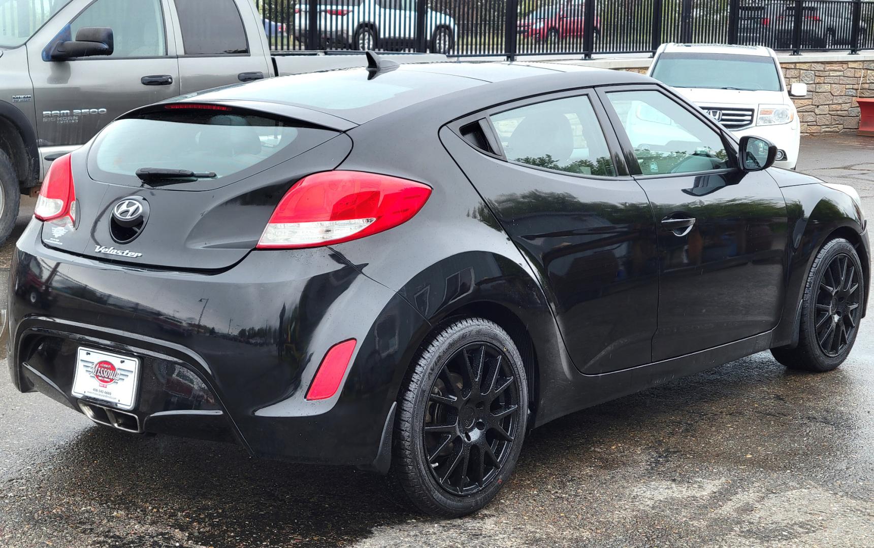 2013 Black /Black Hyundai Veloster 3 door Coupe (KMHTC6AD6DU) with an 1.6 Liter I4 FI DOHC 16V engine, Automatic transmission, located at 450 N Russell, Missoula, MT, 59801, (406) 543-6600, 46.874496, -114.017433 - Photo#4